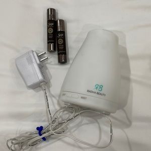 2 Saje essential oils and diffuser